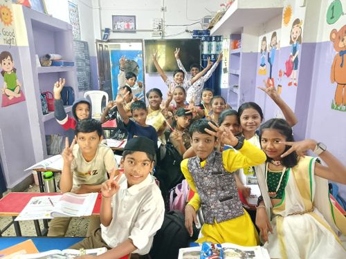 Students doing craft activity in classroom