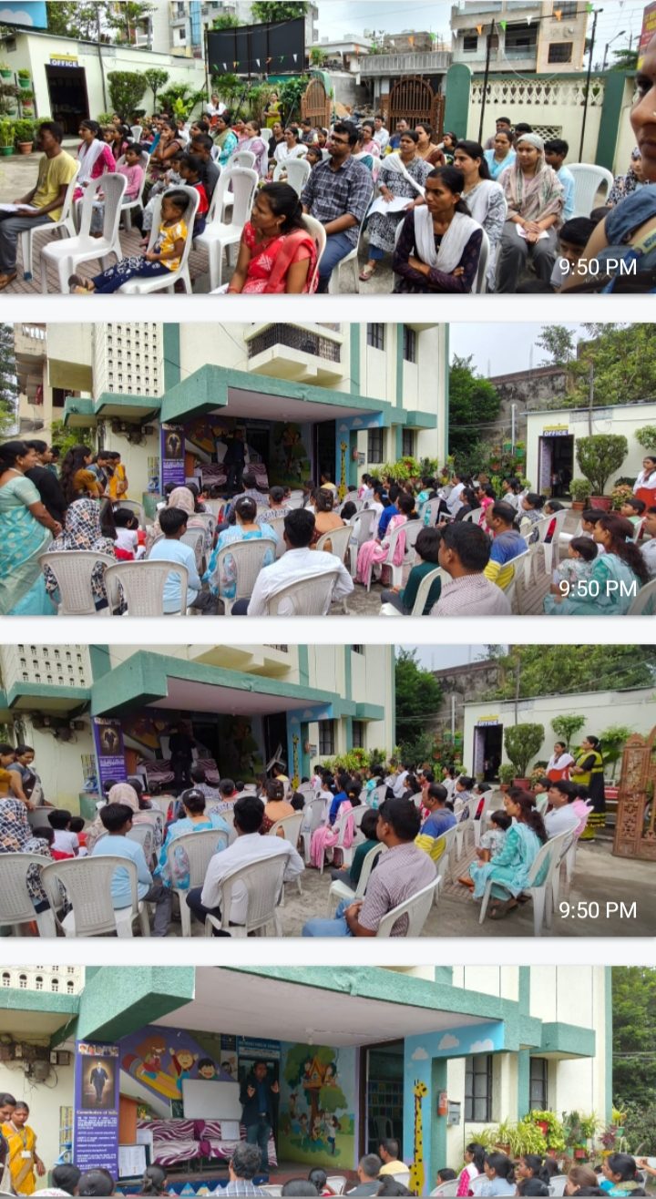 Students gathered at the colourful school entrance