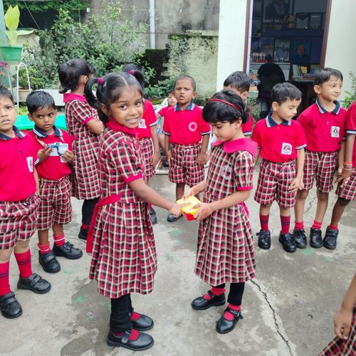 Children doing yoga in a circle